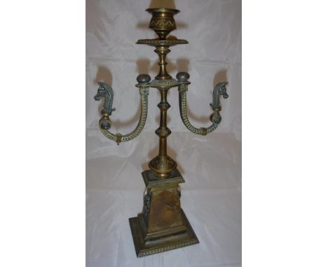 A circa 1900 French candlestick in the Empire taste with Egypto classical style decoration