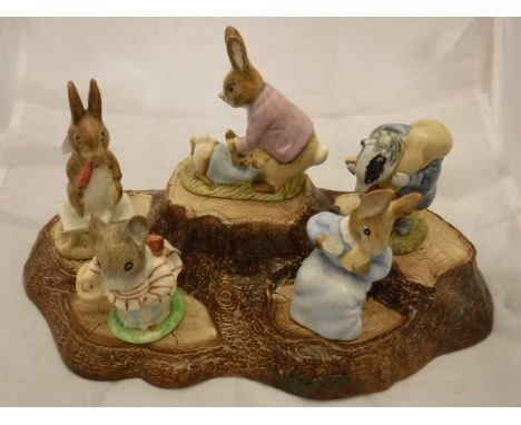 A collection of Beswick Beatrix Potter figures including Little Pig Robinson Spying 1987, Tailor of Gloucester 1949, Aunt Pet