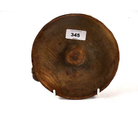 A Robert ‘Mouseman’ Thompson pipe smoker’s ashtray, with central raised knop, mouse figure in high relief to the side of the 