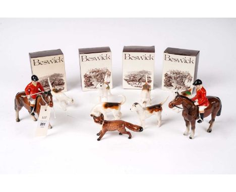A collection of Beswick hunting animal figures, comprising: six hounds and a fox, some boxed; together with two foreign ceram