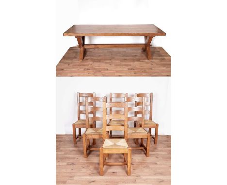A substantial oak refectory dining table, with rectangular top raised on cross legs, 100 x 240 x 75cms high; together with a 