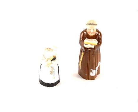 A Royal Worcester candle snuffer figure in the form of a monk, printed mark in black, 12cms; and another in the form of a nun