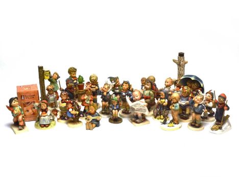 A collection of Goebel Hummel figures, including: a lamp modelled as tree, with a girl with a lamb in front of it, 18cms high