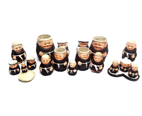 A collection of Goebel ‘Monk’ character jugs; cruets; and tankards. (15)