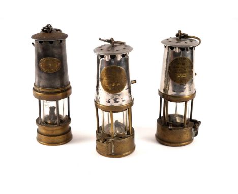 Two Eccles Protector Lamp &amp; Lighting Co. Ltd. miner's safety lamp, Type 6RS, 25cms high (excluding handle); together with