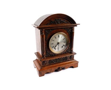 A Victorian eight-day oak mantel clock, with silvered Roman dial and two train movement by Winterhalder &amp; Hofmeier, the c