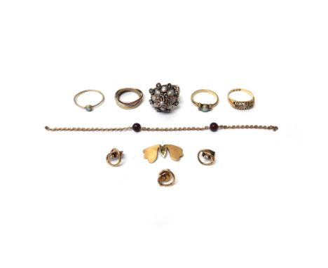 A group of mostly gold jewellery, comprising; a 9ct three colour gold Russian style wedding ring, an 18ct gold and colourless