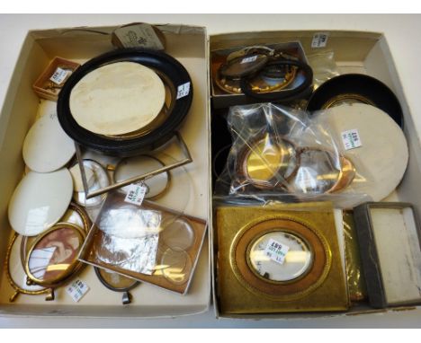 A large quantity of framing accessories relating to portrait miniatures including; glass, frames, insets, etc (qty).