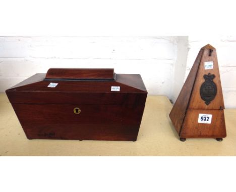 A Kohler & Son mahogany cased metronome of obelisk form, 23cm high and a Victorian mahogany tea caddy of sarcophagus form, 30