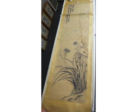 A Chinese hanging scroll painting of lilies, 19th century, ink and slight colour on paper, inscribed and with two seals, 170c