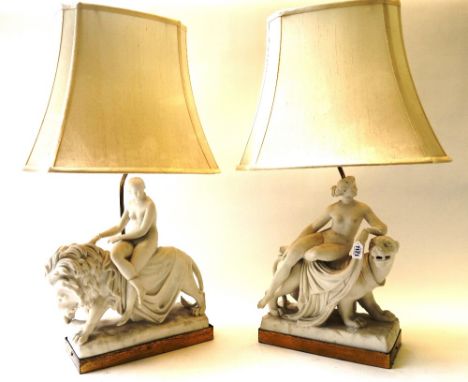 A pair of Minton parian ware figure groups, 19th century; 'Una and the Lion' and 'Ariadne and the Panther', modelled by John 