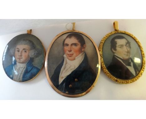 An early 19th century portrait miniature on ivory of a gentleman, signed with initials 'HH' and dated 1820, 5.5cm; and two ot