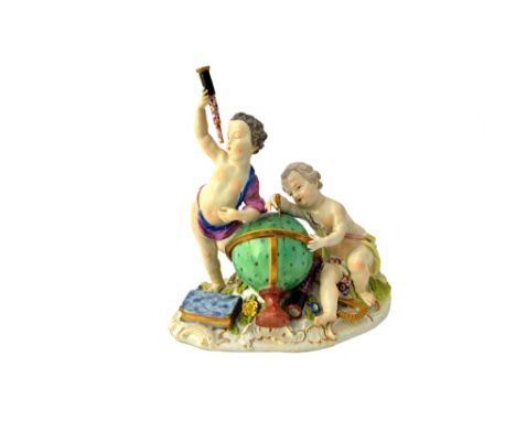 A Meissen group of two putti emblematic of astronomy, mid 18th century, blue crossed swords mark, modelled with a globe, comp