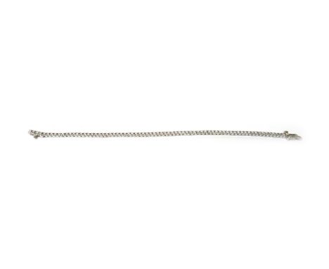 A white gold and diamond bracelet, mounted with a row of circular cut diamonds, on a foldover clasp, detailed 18 K, length 17