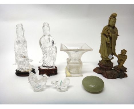 A group of Chinese works of art, Qing Dynasty, comprising; two rock crystal figures of Guanyin, tallest 20cm. high, wood stan