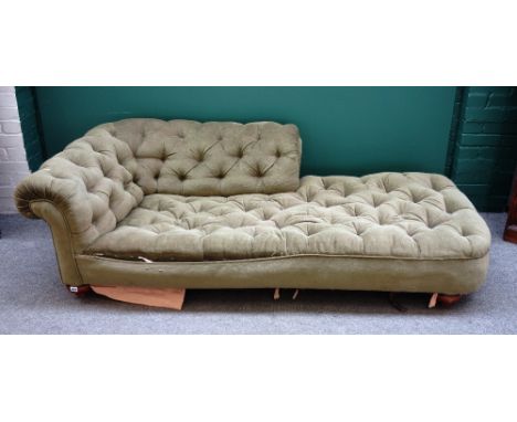 A deep seated 19th century button back Chesterfield style day bed, on mahogany bun feet, 205cm wide.