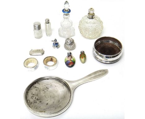 Silver and silver mounted wares, comprising; a pale blue enamelled and cut glass scent bottle, four further glass scent bottl