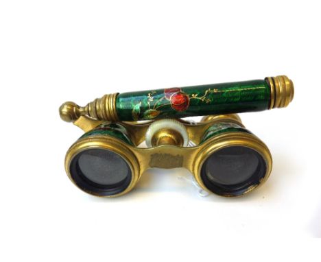 'Chavance & Co, Paris'; a pair of French enamel opera glasses, with gilt cherry enamel against a green ground, with mother of