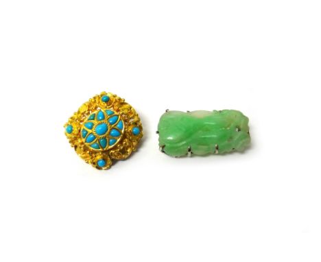 A carved jade brooch, decorated and pierced with a fruit motif and a gold and turquoise set brooch, probably Indian, mid 19th