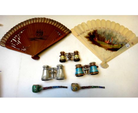 A pair of French brass and enamel decorated opera glasses, early 20th century, the mother of pearl eyepieces detailed 'Ling T