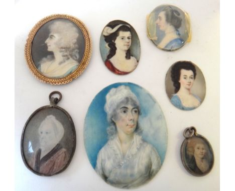 A late 18th English School portrait miniature on ivory of a woman in profile, wearing blue dress with pearl necklace, 3.7cms 