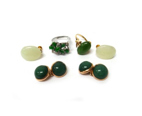 A jade and diamond ring, mounted with six pear shaped jades and otherwise set with circular cut diamonds, a gold ring mounted