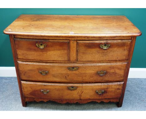 An early 19th century French walnut bowfront commode of two short and two long drawers, over shaped frieze, 115cm wide.