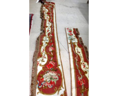 A 19th century and later Aubusson tapestry pelmet with tasselled fringe, 420cm x 50cm, two half pelmets, 210cm x 50cm , four 