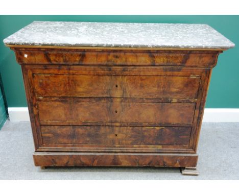A 19th century French commode, the rectangular black marble top over a walnut five drawer base, on splayed block feet, 130cm 