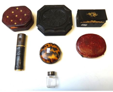 An early 19th century tortoiseshell and inlaid snuff box of engine turned rectangular form (7.5cm wide), a leather bound meta