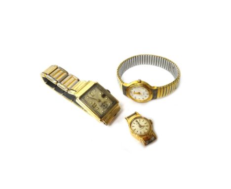 A lady's gold oval cased wristwatch, the jewelled movement detailed Rolex Precision, the circular silvered dial with gilt bat