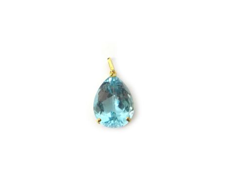 A gold pendant, mounted with a drop shaped blue topaz, the loop detailed 18 K 750.