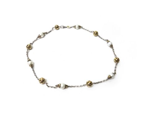 A silver, gold and cultured pearl necklace, by John Hardy, the oval link chain spaced with cultured pearls and gold decorated