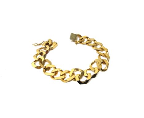 A gold faceted curb link bracelet, on a snap clasp, detailed 14 K, length 18cm, weight 34 gms.