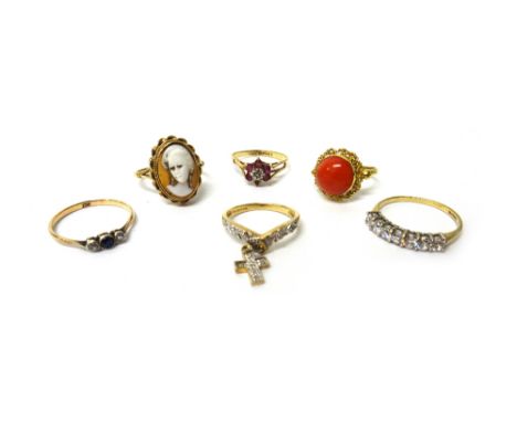 A gold and coral ring, detailed 750, a 9ct gold and diamond set ring, with a diamond set pendant cross charm as fitted, a 9ct