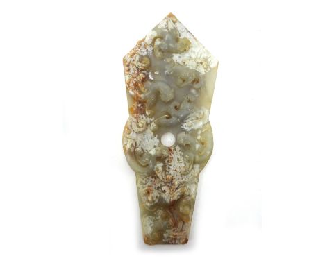 A Chinese jade gui, carved on one side in high relief with chilong, the reverse as a bi disc between taotie masks, 29cm.high.