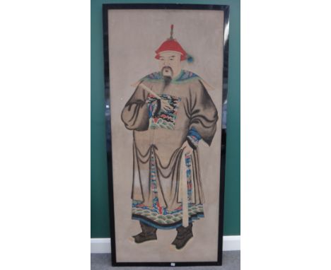 A large Chinese full-length portrait of an official, 19th/20th century, ink and colour on paper, 205cm. by 86cm., framed