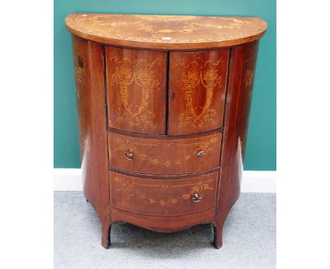 An 18th century style marquetry inlaid mahogany bowfront commode with pair of cupboard doors over pair of drawers on splayed 