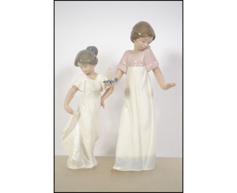 Two Nao female ceramic figurines.  One young girl raising her skirt with one hand; marked to base with Nao 1989.  The other, 