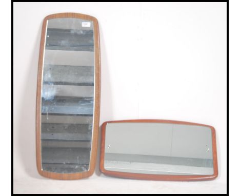 2 vintage 20th century 1970's G-Plan style atomic frameless wall mirrors. The mirrors of shaped sputnik form set to chamfered