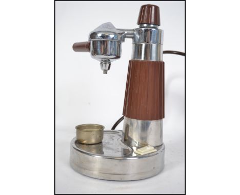 A vintage 1940's / 1950's coffee espresso maker by Utentra. Italian made of  stainless steel and brown plastic construction. 