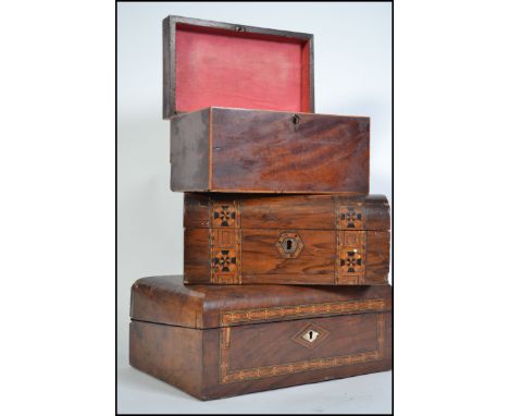 A  collection of boxes to include a 19th century Georgian mahogany inlaid caddy box together with a tunbridge inlaid box and 