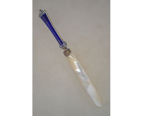 A silver hallmarked enamel and mother of pearl letter opener. The enameled handle having a blue ground, the hilt having a Bir