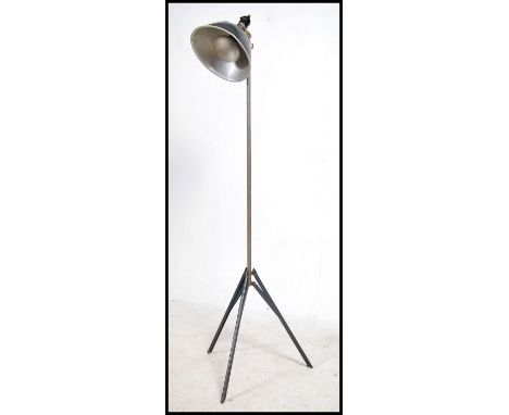 A vintage / retro floor standing lamp, converted from a Smith Victor camera light having a polished aluminium pendant shade r