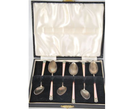 A set of six Silver guilloche enamel coffee spoons, having a London i,port mark and dating to 1913. 