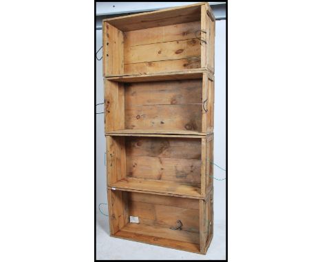 A stack of 4 vintage large wooden Industrial size crates. Panel seats and slatted bases with wire / rope handles stacking nic