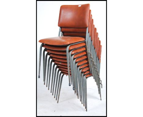 A set of 10 vintage 1960's school / Industrial hall chairs raised on grey tubular metal frames with ochre red vinyl upholster