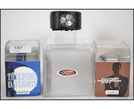A collection of 3 vintage Swatch watches James Bond series to  include The Living Daylights, Tomorrow Never Dies and a 007 40