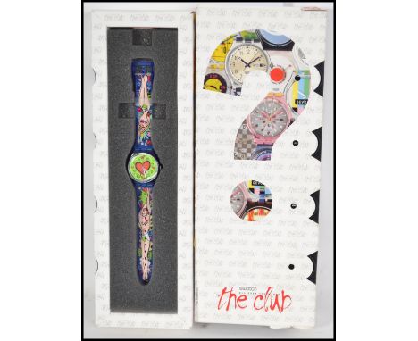 An original Swatch watch ' The club, All over the World ' series wristwatch complete in the original packaging with unusual c