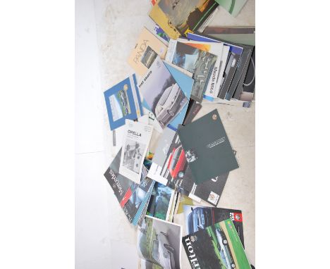 A collection of vintage car brochures to include many car manufacturers